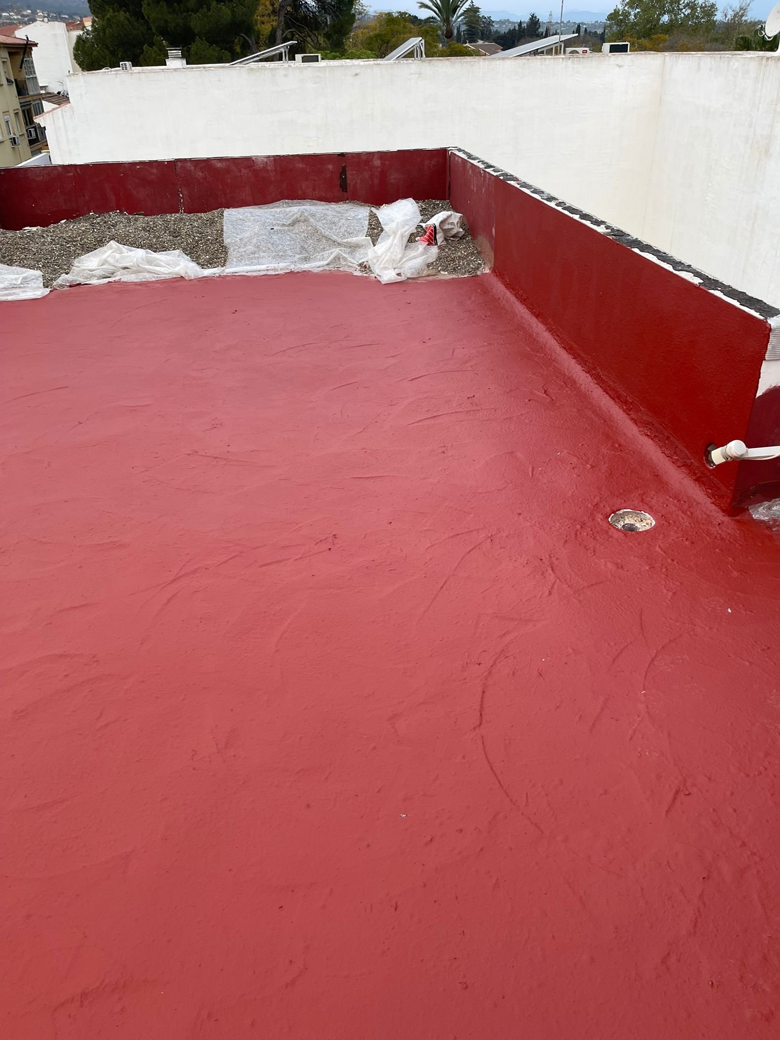 Detalle de impermeabilización roja
